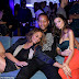 Lucky guy! John Legend fails to suppress a smile as he’s sandwiched between his leggy wife Chrissy Teigen and stunning model Emily Ratajkowski at LA event