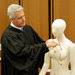 Judge John P. O'Donnell with mannequins showing the gunshot wounds to Timothy Russell and Malissa Williams.