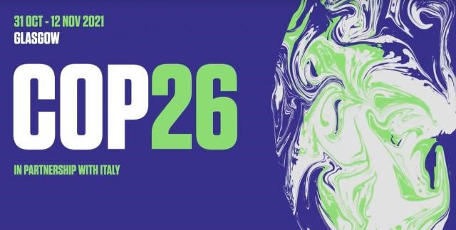 Graphic image with the words "COP26" in white and green writing against a purple background.