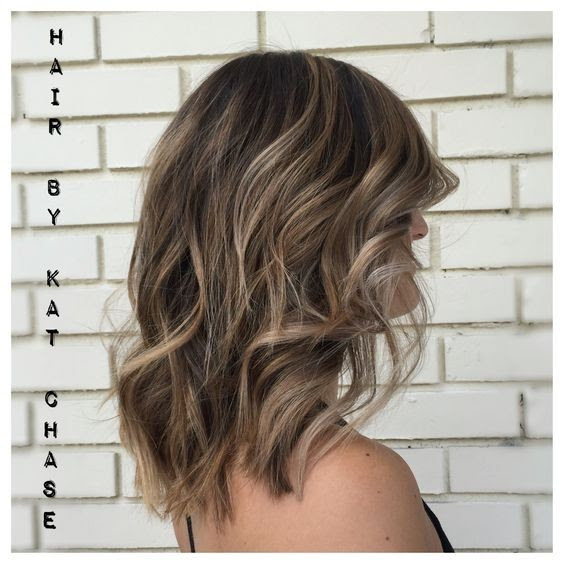 The hair is parted in the middle or to the side. 10 Pretty Layered Medium Hairstyles 2021