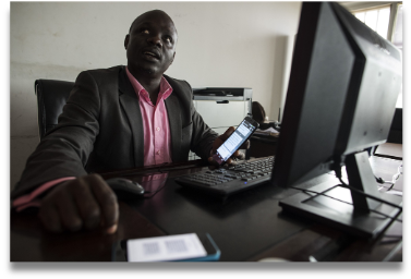 man-sitting-at-desk