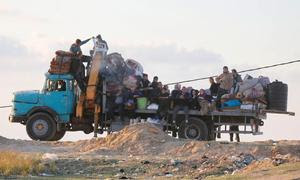 Familias palestinas huyendo hacia el sur de Gaza.