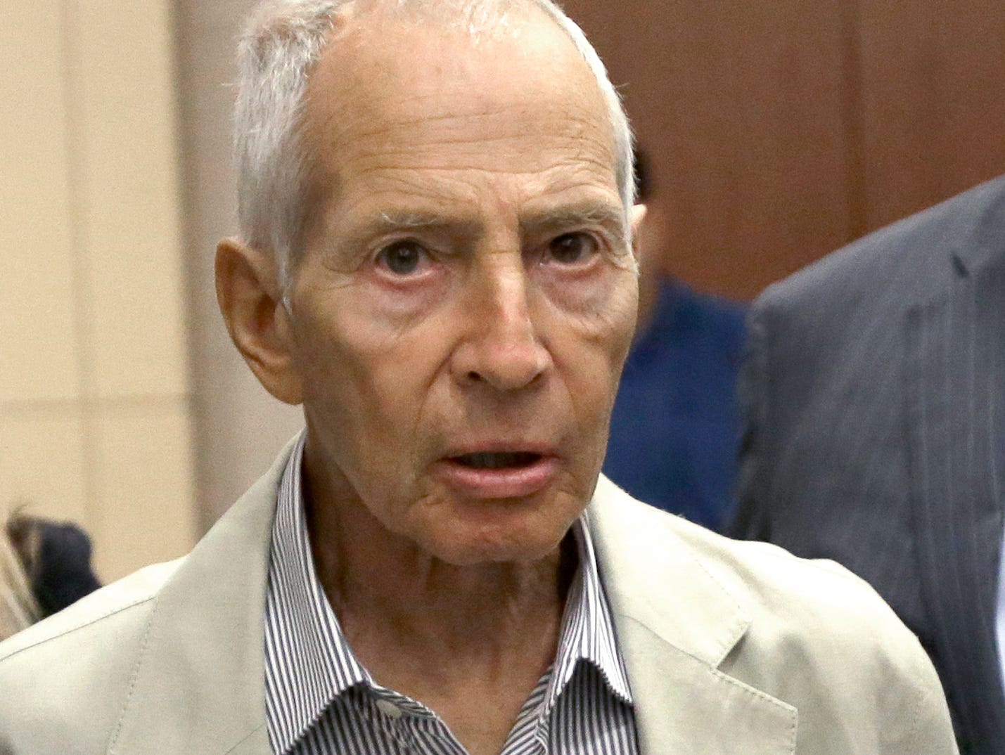 New York City real estate heir Robert Durst leaves a Houston courtroom On August 15, 2014.