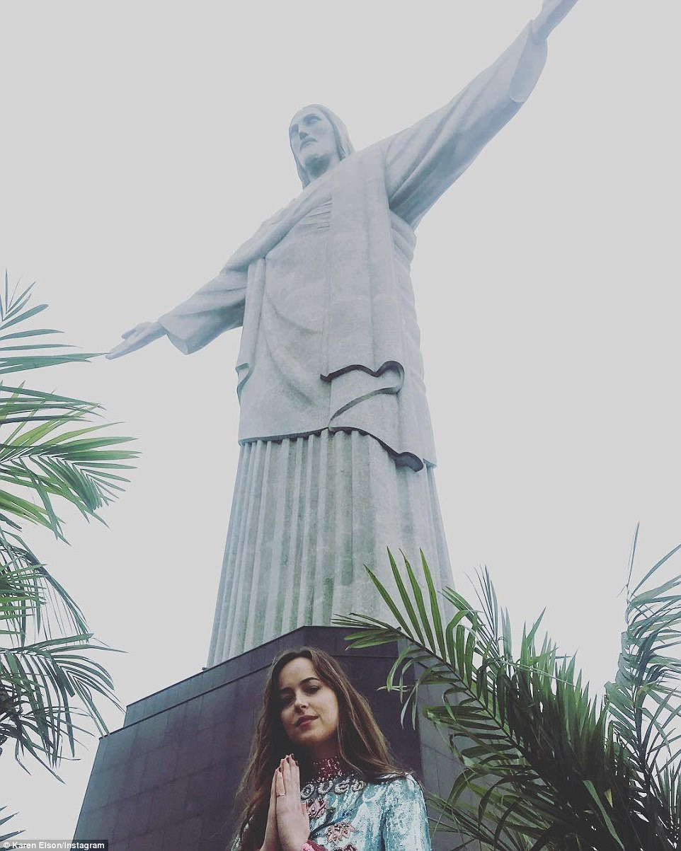 Superstar: After the ceremony, Dakota was seen posing by the Christ the Redeemer statue for a fun snap posted on Instagram by her fellow guest, singer Karen Elson