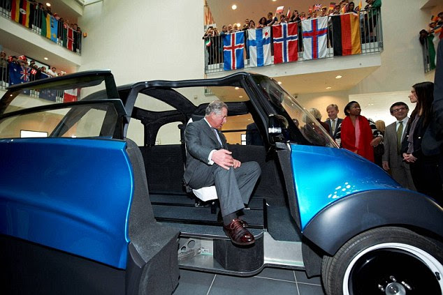 One right royal potential owner: Prince Charles has a look inside one of ECOmove's electric concept cars during a visit to Denmark earlier this year