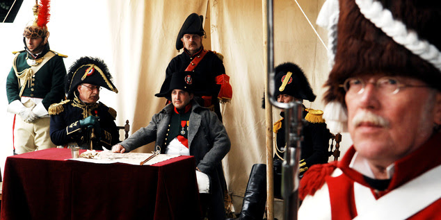 In this June 16, 2007,  file photo, actors dressed as soldiers re-enact the Battle of Waterloo in Braine-l'Alleud, near Waterloo, Belgium. The Battle of Wate...