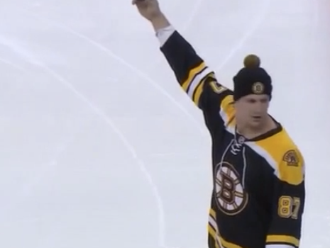 Rob Gronkowski spikes puck at Bruins faceoff.