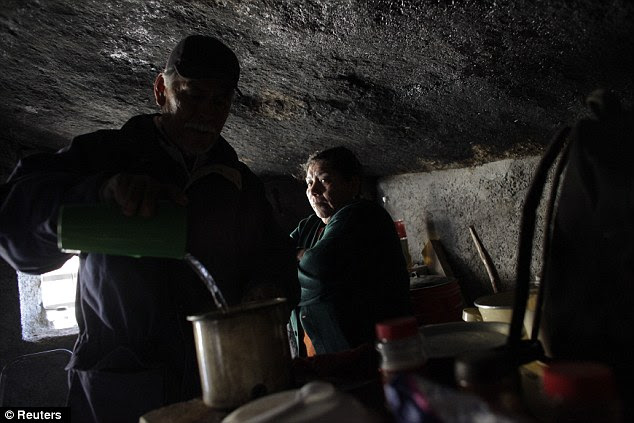 Struggle: Santa Martha de la Cruz Villarreal, right, and her husband, Benito Hernandez said winters in the desert were hard