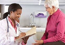 photo of a female doctor with a female patient