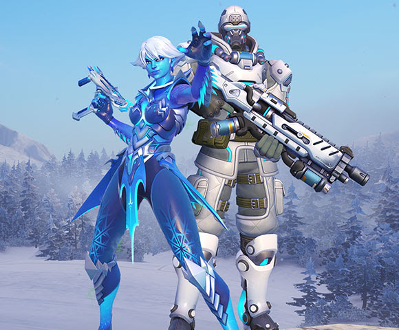 Two characters from Overwatch standing with big guns in the snow-covered mountains.