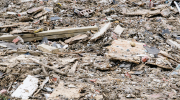 Rubble on a lot following a tornado.