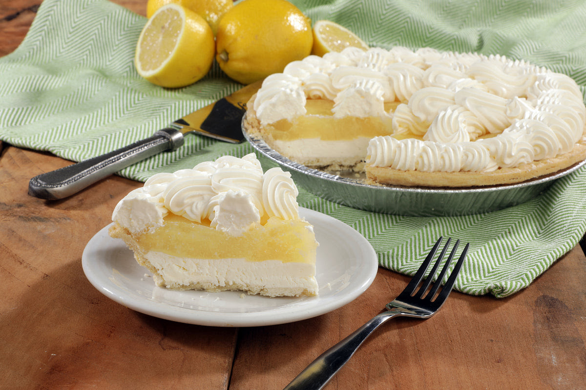 Begin with the cream cheese mixture, spreading it evenly into the bottom of your cooked pastry shell. Tippin S Lemon Supreme Pie New Tippin S Gourmet Pies