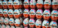 (FILES) In this file photo taken on November 18, 2014, chocolate Kinder Eggs are on display in a supermarket in Hanover, central Germany. - Belgian authorities ordered the closure of a Kinder chocolate factory on April 8, 2022, behind a wave of Salmonella cases in several European countries and the United States. The factory, owned by Italian confectionery giant Ferrero, was ordered shut "following the findings of the last few hours that information provided by Ferrero is incomplete", Belgium's food safety authority AFSCA said in a statement. (Photo by Ole SPATA / dpa / AFP) / Germany OUT