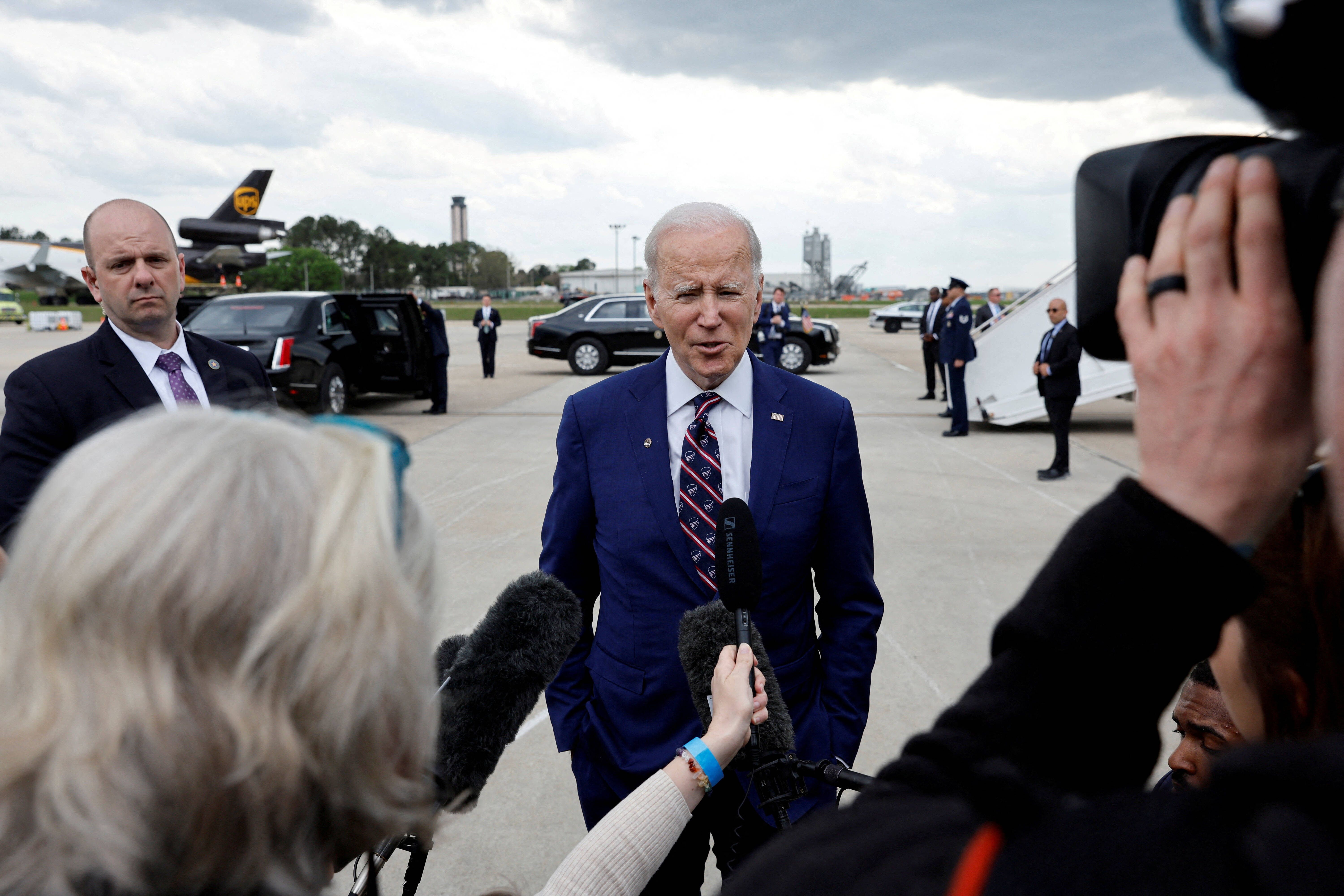 U.S. President Joe Biden speaks with reporters before boarding Air Force One to return to Washington from Raleigh-Durham International Airport, Morrisville, North Carolina, U.S., March 28, 2023. REUTERS/Jonathan Ernst