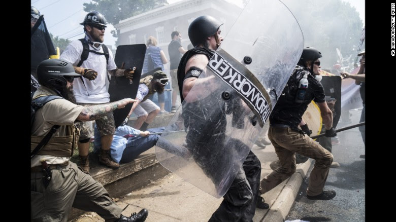 Right-wing rally members clash with counterprotesters in Emancipation Park, where white nationalist groups gathered for a rally. 