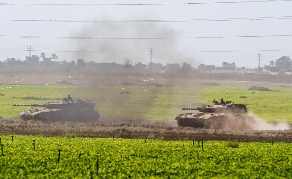 Israel announced Thursday it was launching a ground operation into Gaza after more than a week of airstrikes and rockets between it and Hamas. Pictured: Israeli tanks headed toward the Gaza border.