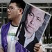 Demonstrators in Hong Kong protesting the detention of Pu Zhiqiang, a civil rights lawyer from Beijing charged with 