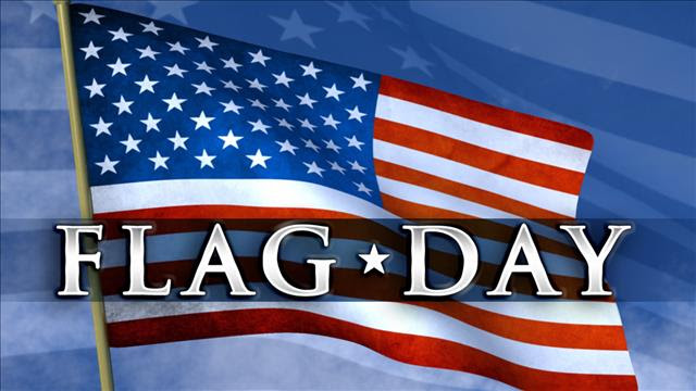 Photo of a US flag with the words "Flag Day."