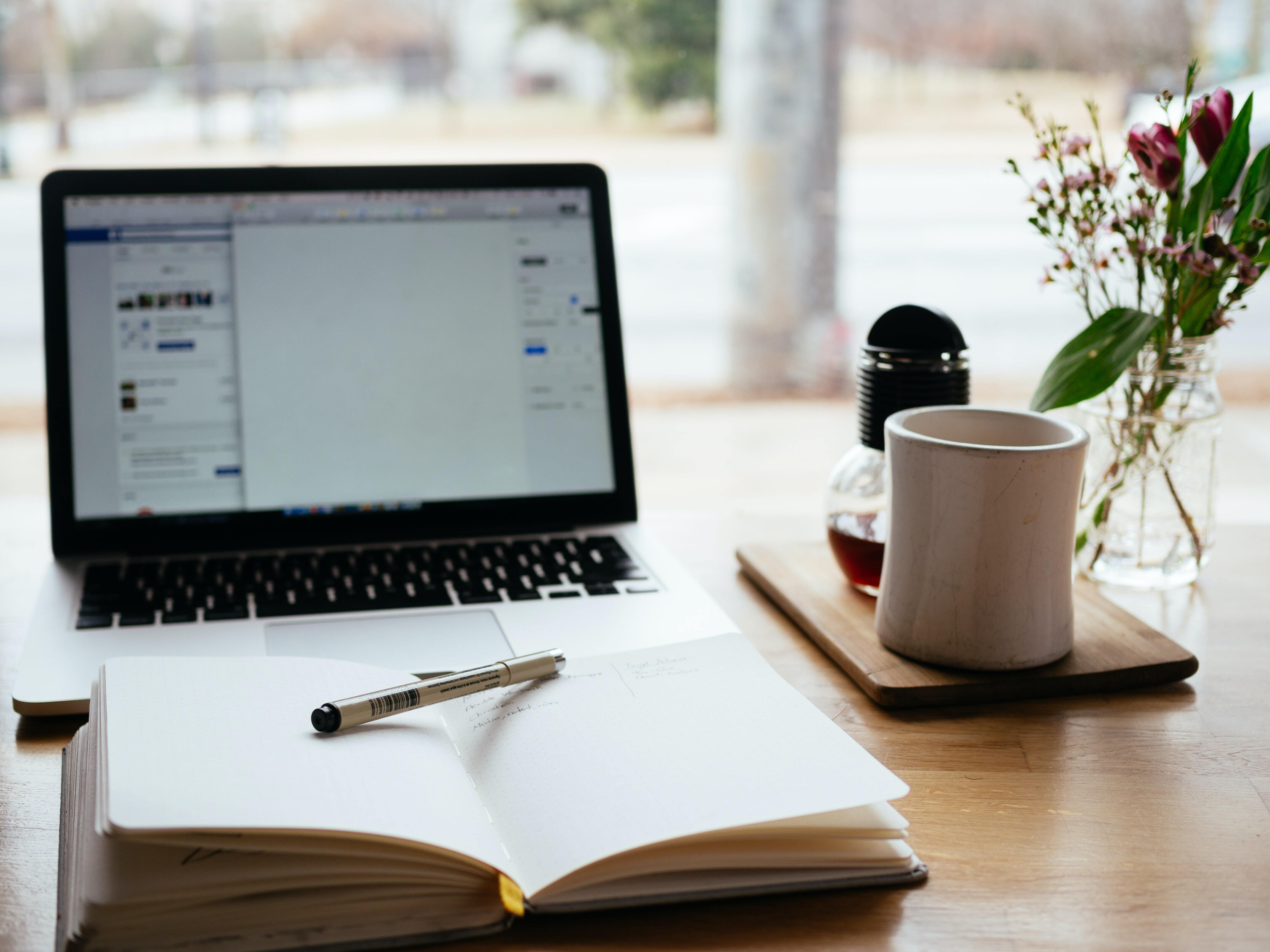 Lap top, notebook, coffee mug