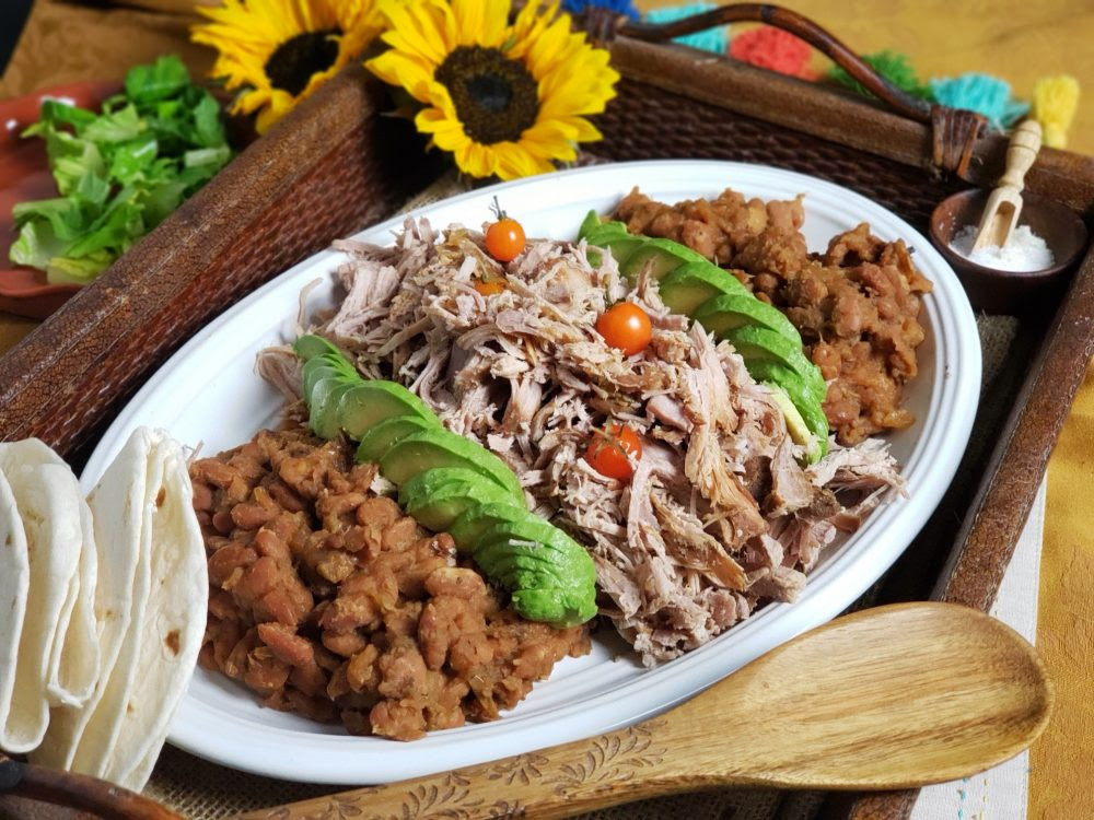 Combine pork roast, pinto beans, green chiles, chili powder, cumin, oregano, salt, pepper and water in slow cooker. Tomatillo Shredded Pork Roast And Pinto Beans For Slow Cooker Thefitfork Com