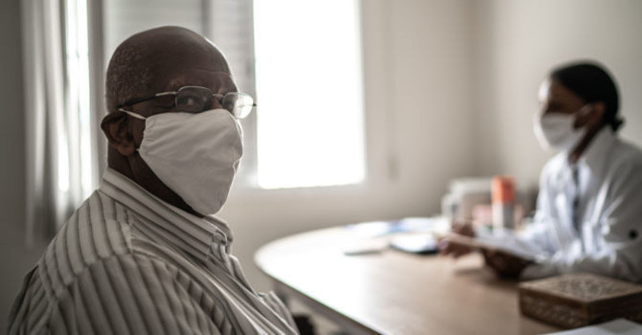 Man sits in doctor's office