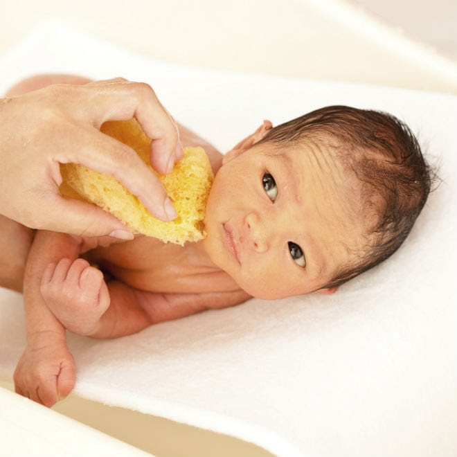 Fill the bath with just enough water to wash your baby. 6 Tips For Bathing Your Newborn Today S Parent