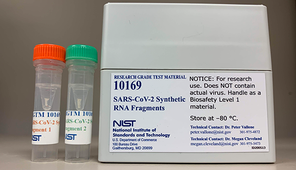 Two vials stand next to a gray box labeled "SARS-CoV-2 Synthetic RNA Fragments."