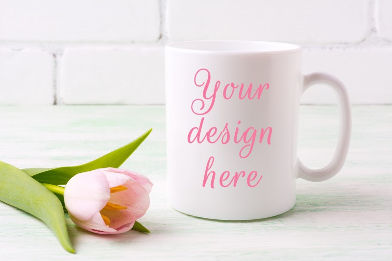 Download Download White coffee mug mockup with tender pink tulip ...